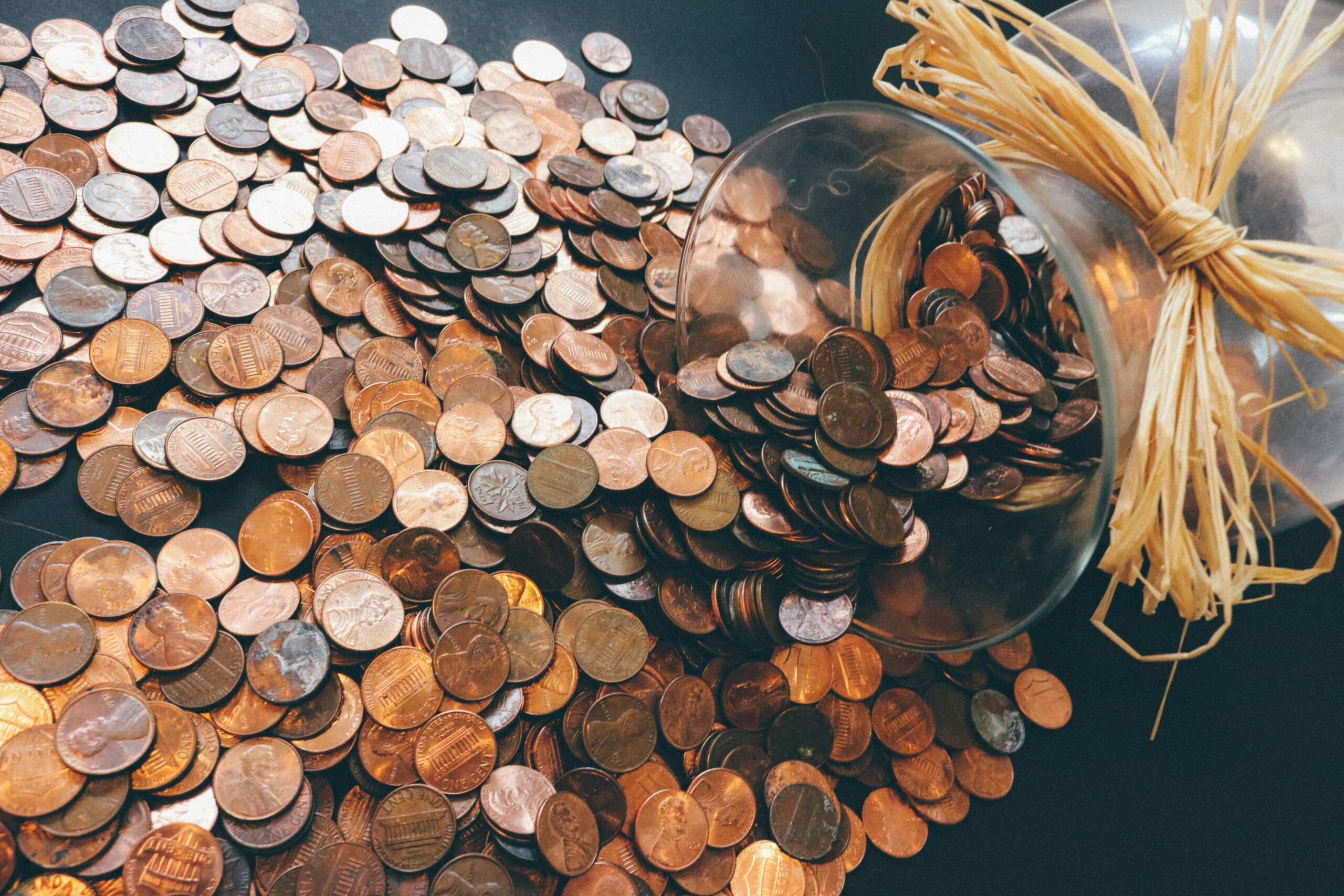 Coins spilling from a jar